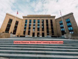Federal Reserve "thinks about" lowering rates.