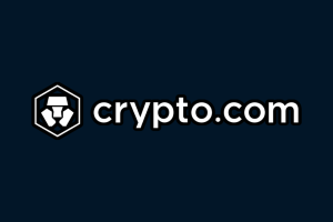 Crypto.com logo in dark blue. Crypto.com quietly discloses that customers will face three-second delay on sports wagers