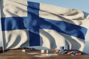 A photograph of the Finnish flag with its distinctive blue Nordic cross on white background. Finland Approves Gambling Act, Opens Licensed Market