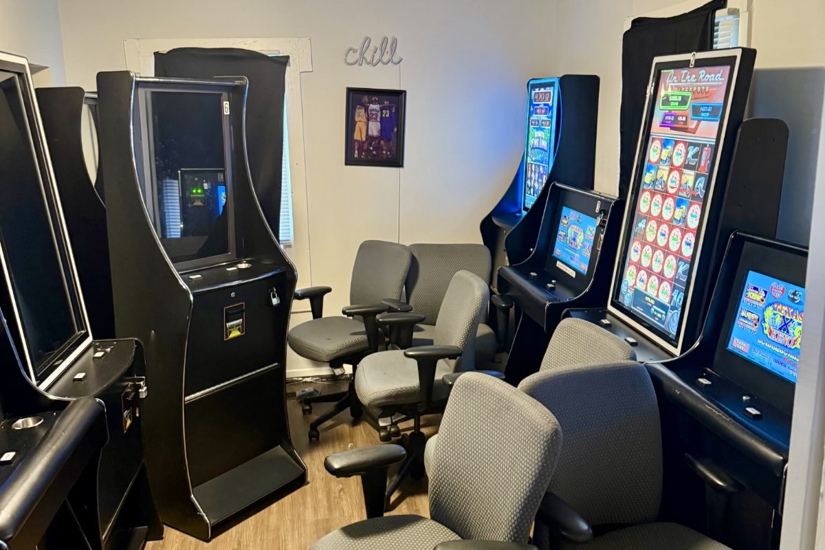 Illegal gambling machines. Illegal gambling machines lined up inside a small room, with multiple electronic gaming cabinets and chairs seized during a Huntsville Police Department investigation.