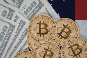 Wolcott indictment alleges $950K crypto scheme on Stake.com. Bitcoin next to US dollars, with US flag in the background